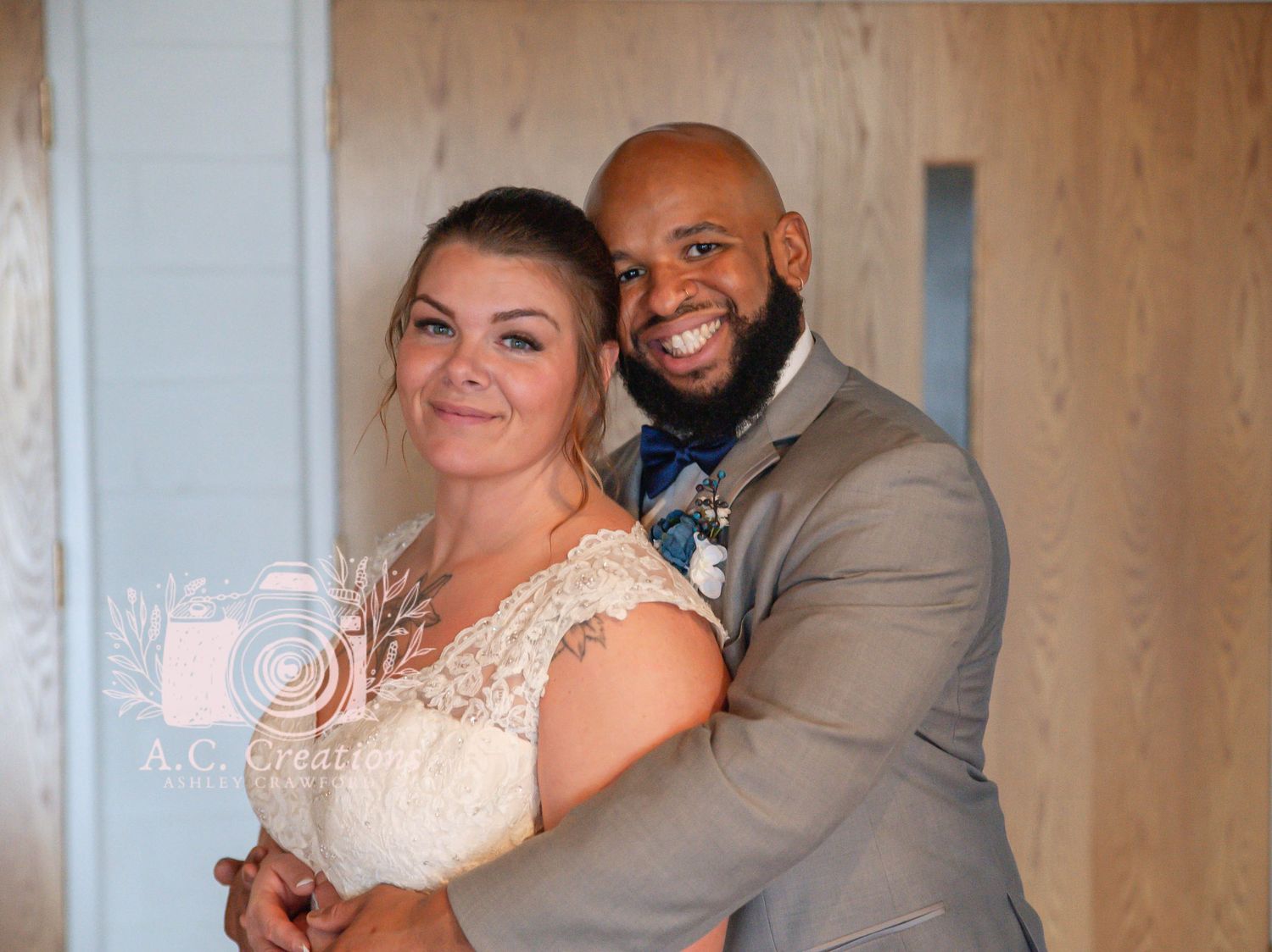 Wedding couple in formal attire sharing an intimate moment.