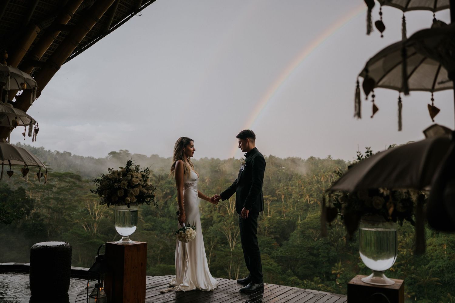 Intimate outdoor ceremony setup with mountain views at sunset.