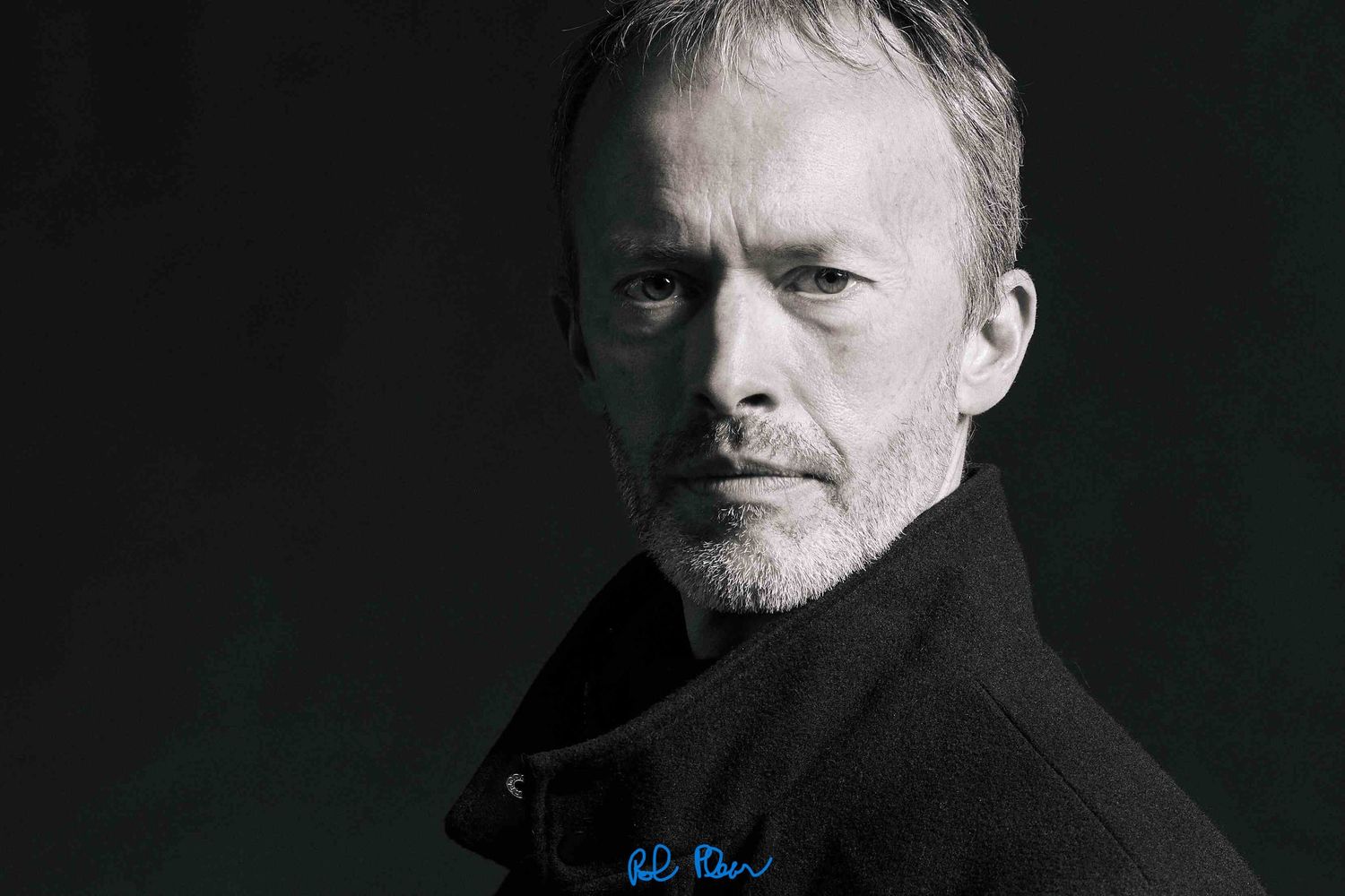 Black and white photo of Rob Pleas, owner of Rob Pleas Photography.