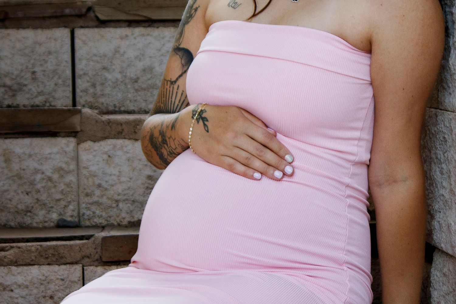 An expecting mother during a maternity photo session at the Botanical Gardens in Amarillo, Texas