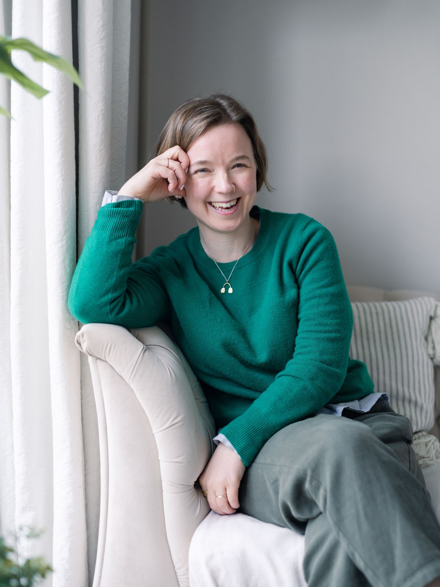 Relaxed natural portrait of creative business owner at personal branding photography shoot at a natural home setting in Deal, kent