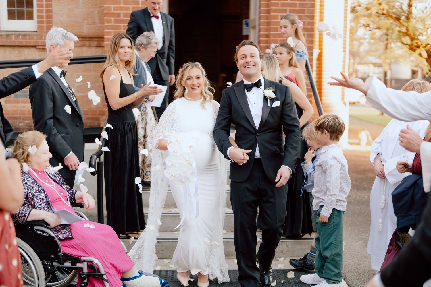 Church wedding ceremony venue with red aisle photographed by Purple Bird Photo, wedding photographer Sydney
