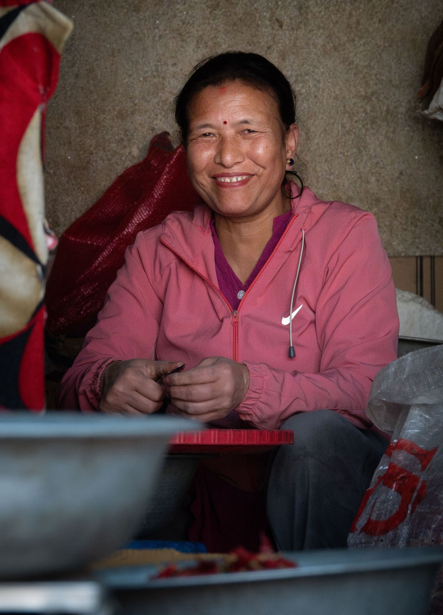 A warm moment captured indoors showing local culture and craftsmanship.