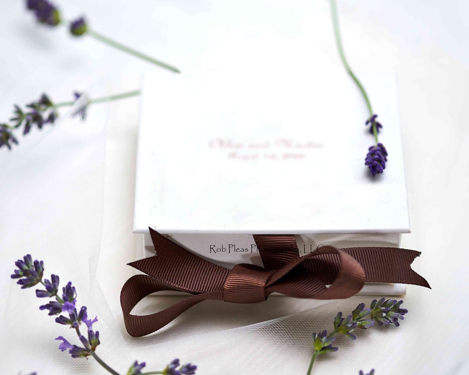 Digital image USB presentation box with cute brown bow surrounded by lavender blossoms.