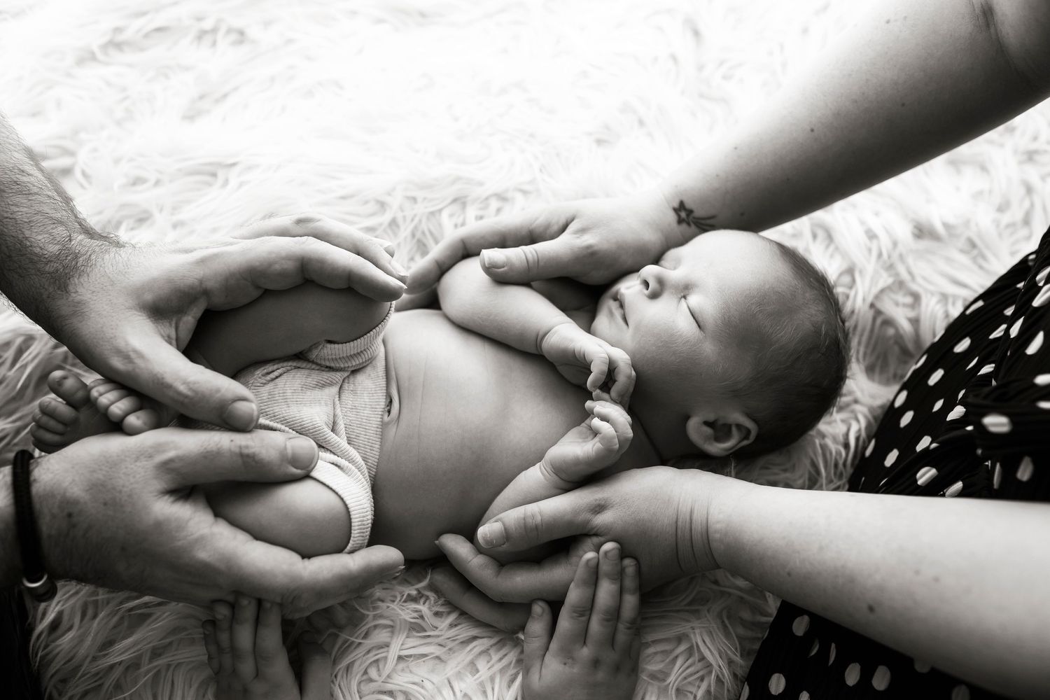 newborn baby swaddled shot by little wonderland photography in widnes cheshire