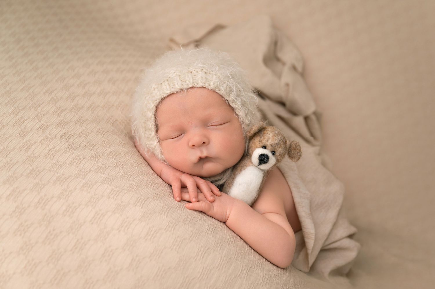 Newborn baby peacefully sleeping during professional newborn photoshoot in Haverhill Suffolk by Yellow Blossom Photography