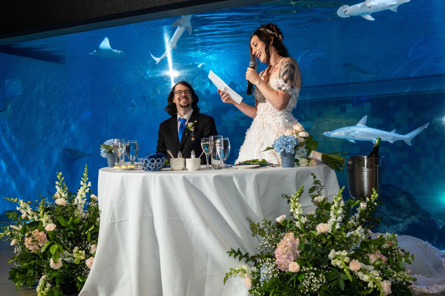 Couple exchanging wedding vows atToledo Zoo Wedding Venue