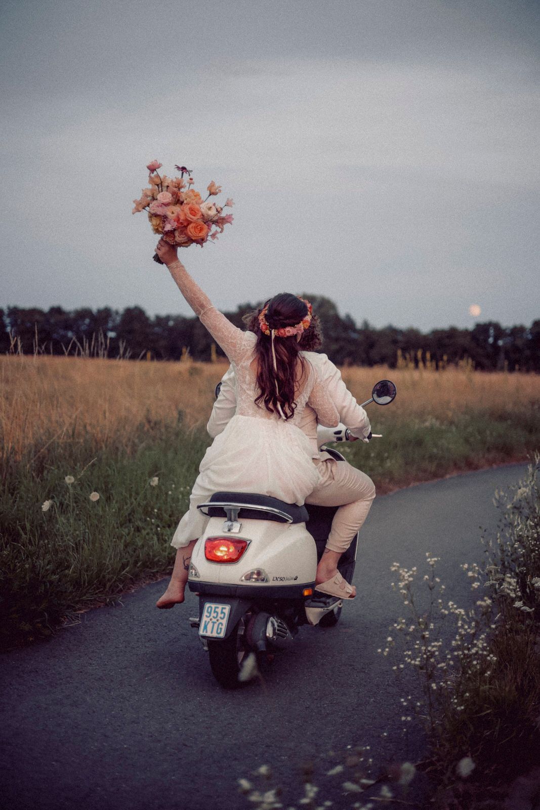 A dreamy sequence of vintage Vespa scooter photos showing a romantic countryside ride with flowers and whimsical movements.