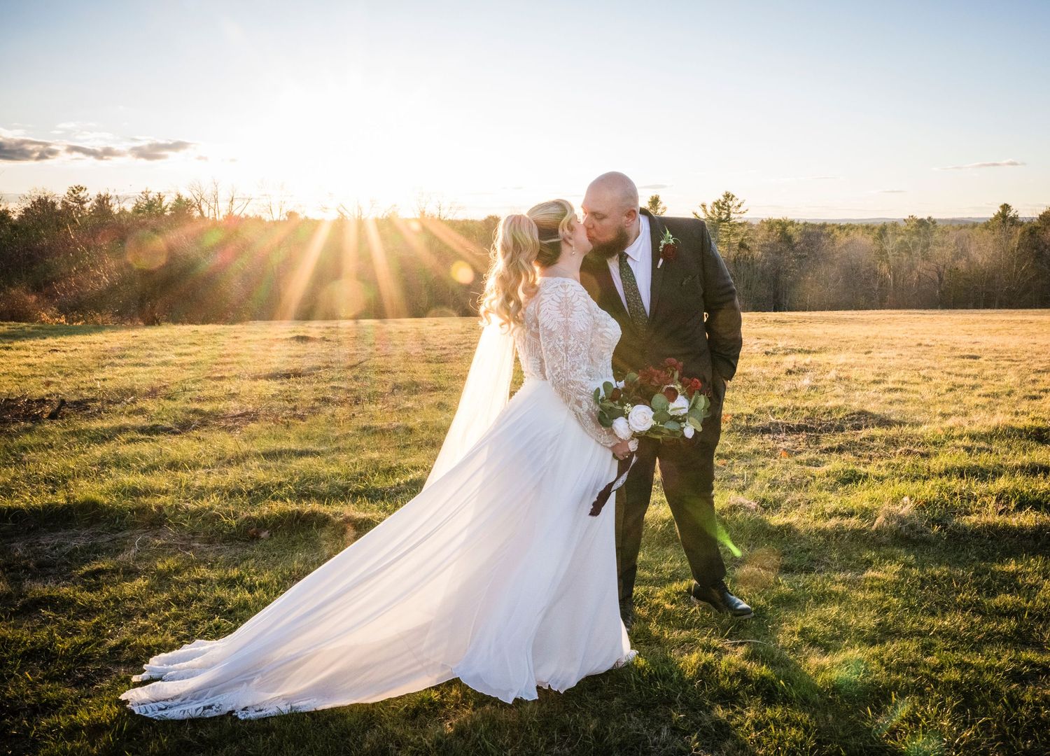 A panoramic sequence of a white wedding dress against the backdrop of a yellow farmhouse with a wraparound porch at sunset.