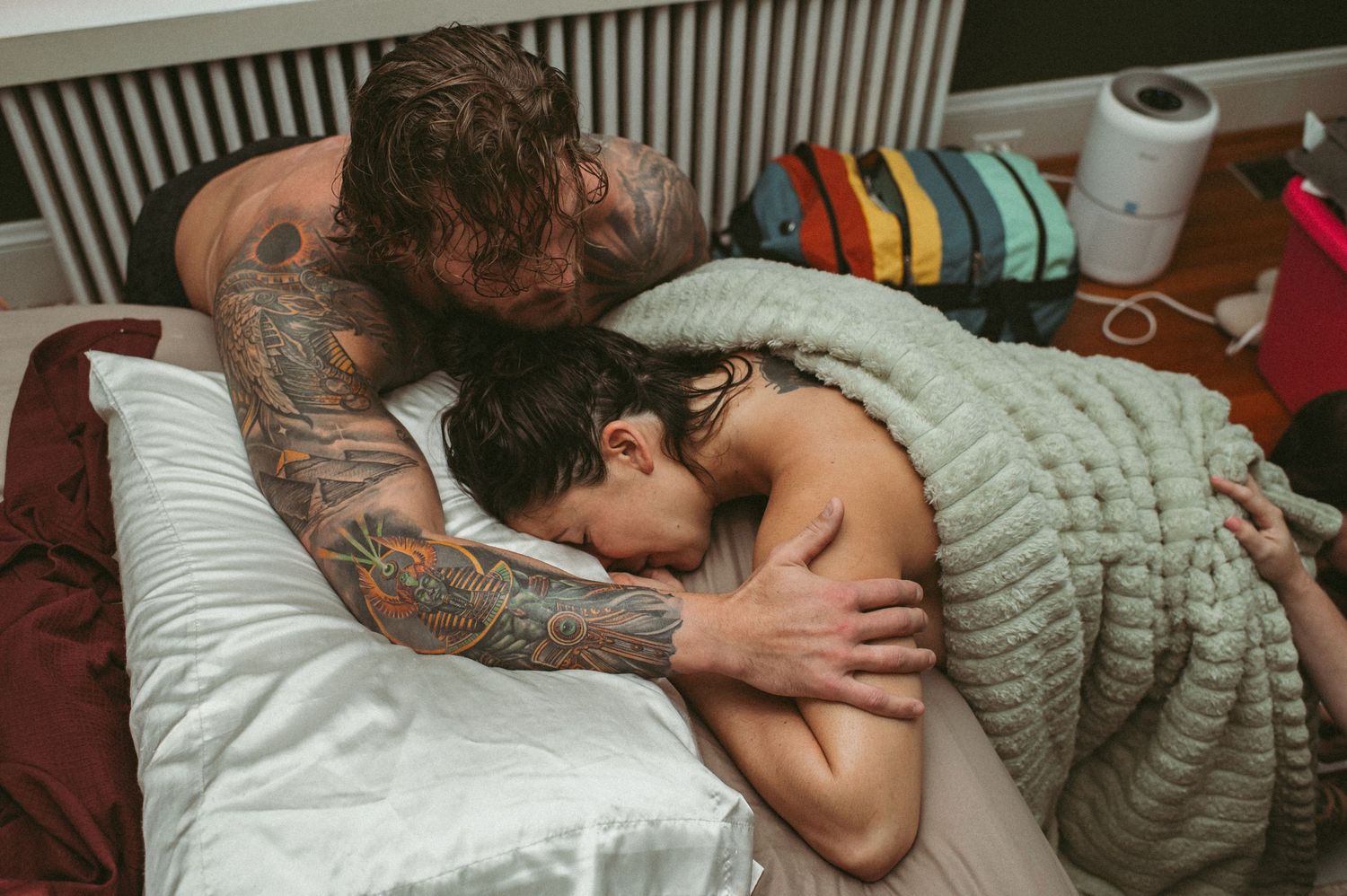 Virginia expecting couple baking together in their Virginia Beach kitchen during their maternity session.