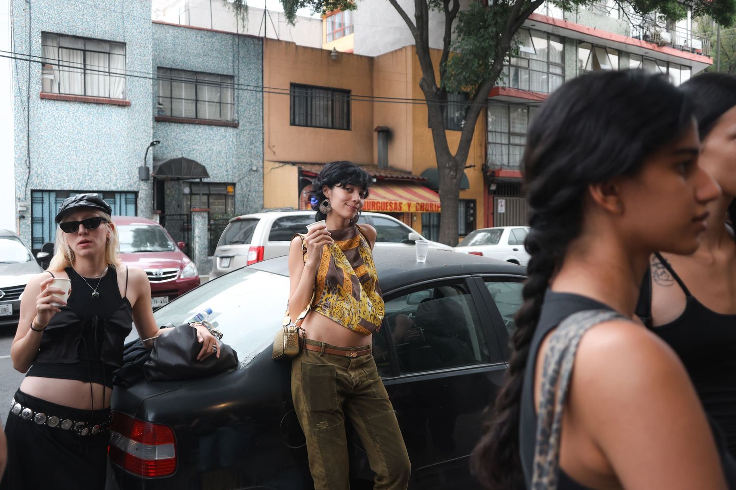 Behind the scenes fashion week photography in Mexico City showing models preparing before a runway show