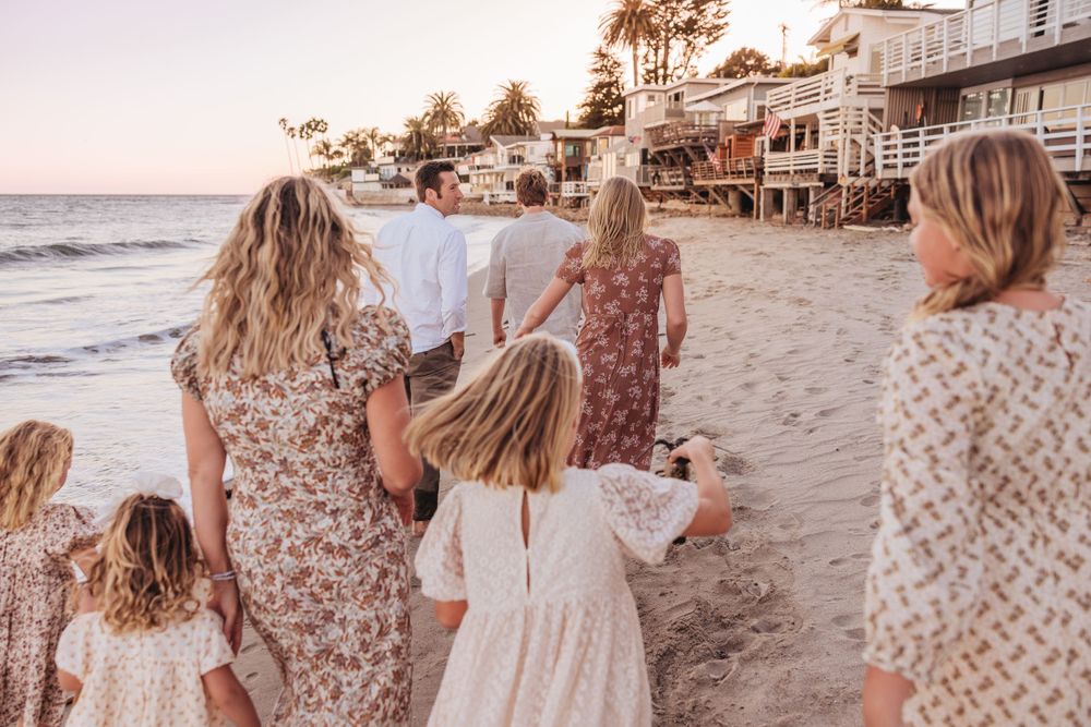 santa barbara family walking along Miramar Beach location