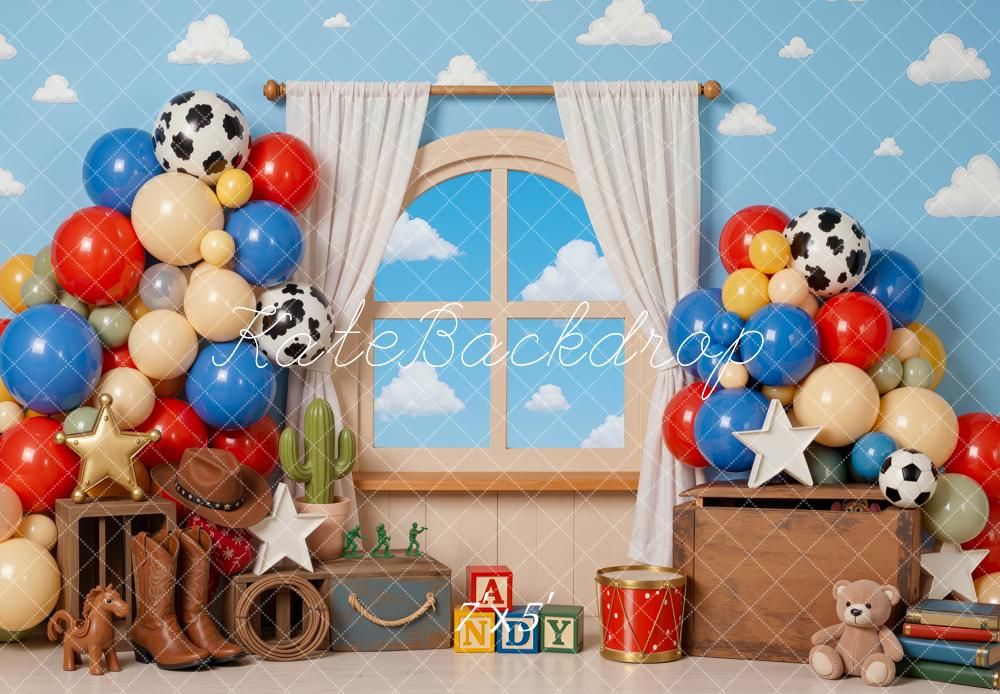 Toy Story themed cake smash backdrop with colorful balloons, cowboy boots, alphabet blocks, and a teddy bear.