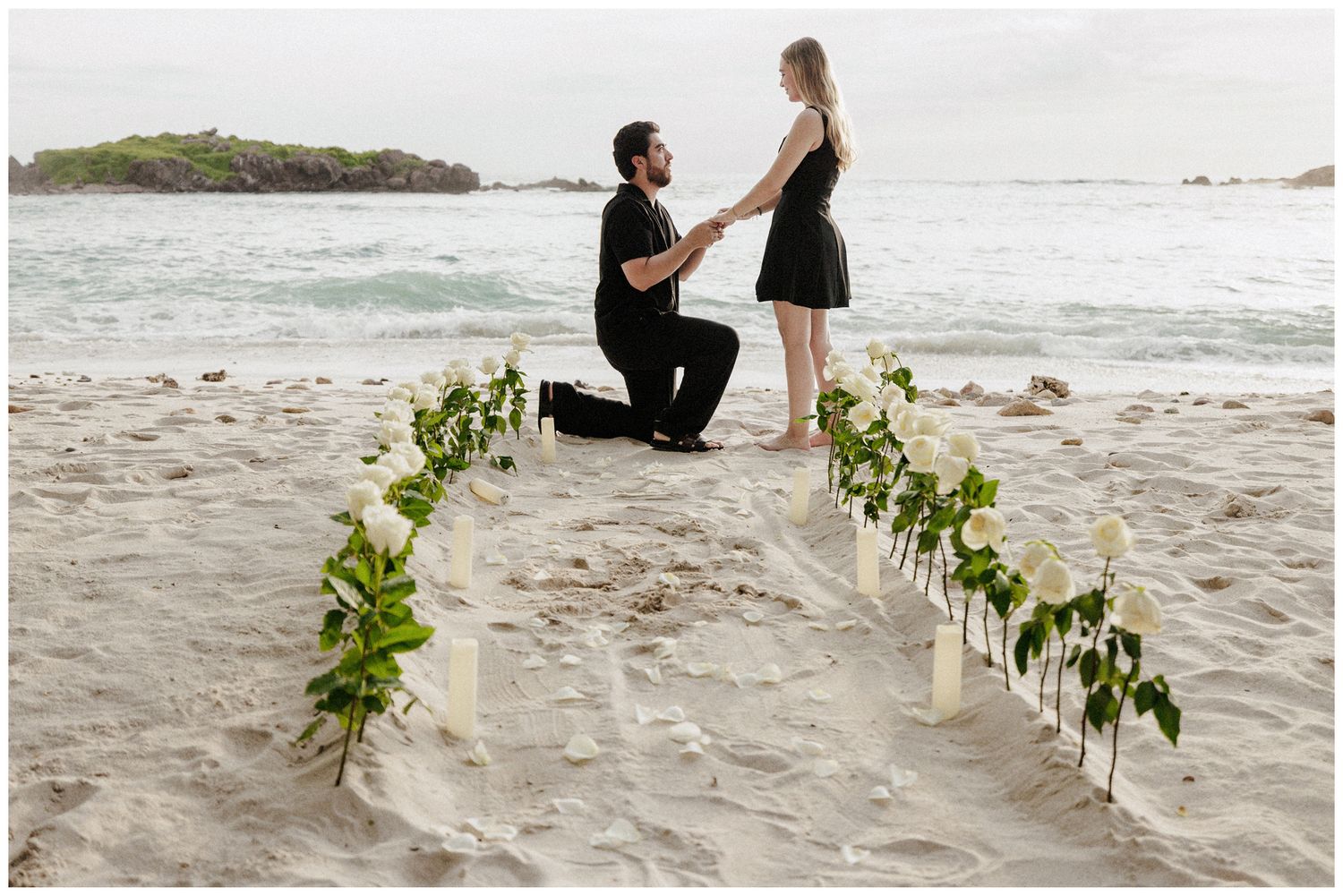 St. Regis Punta Mita family photographer creating beach family photos with genuine laughter by the ocean at golden hour.