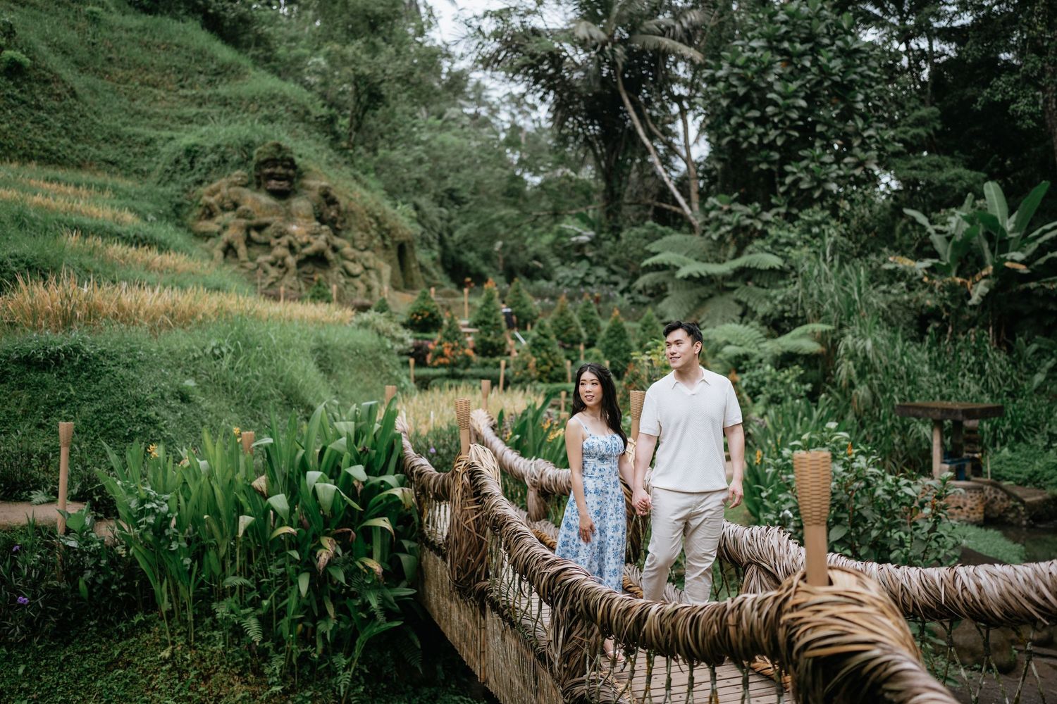 Large woven nest structure provides unique photo opportunities in a tropical garden setting.