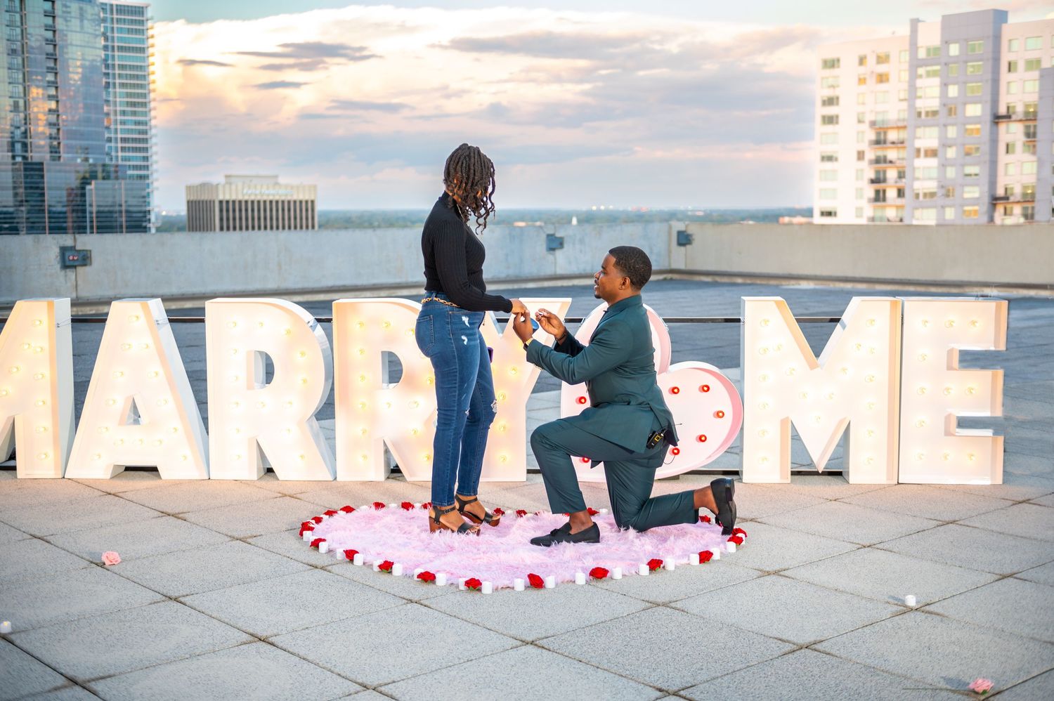 Orlando, Florida, rooftop proposal was captured by Florida wedding photographers.