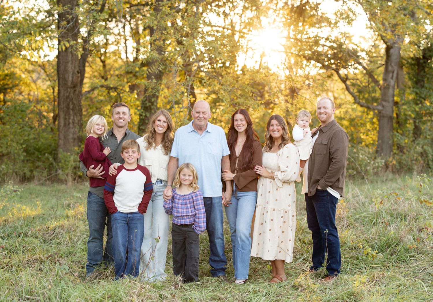Large extended family gathered for outdoor family photos in St. Charles County, Missouri