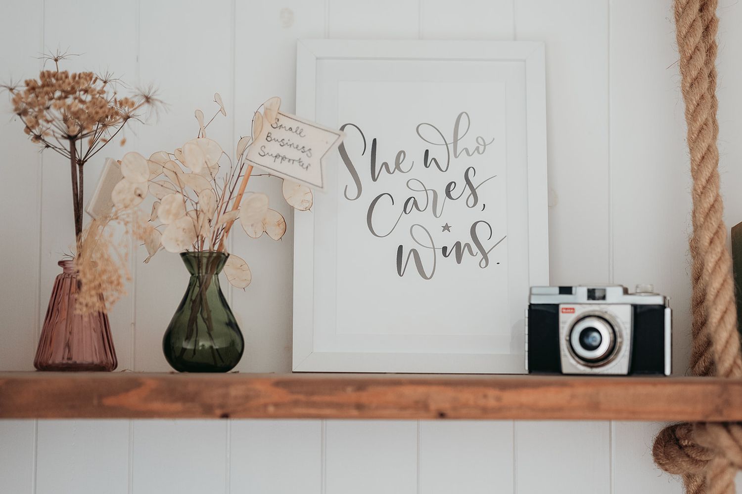 She who dares wins sign from branding photographer in Kent who cares deeply about small brands.