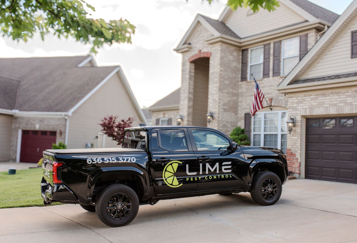 St. Louis brand photography of a black pest control truck