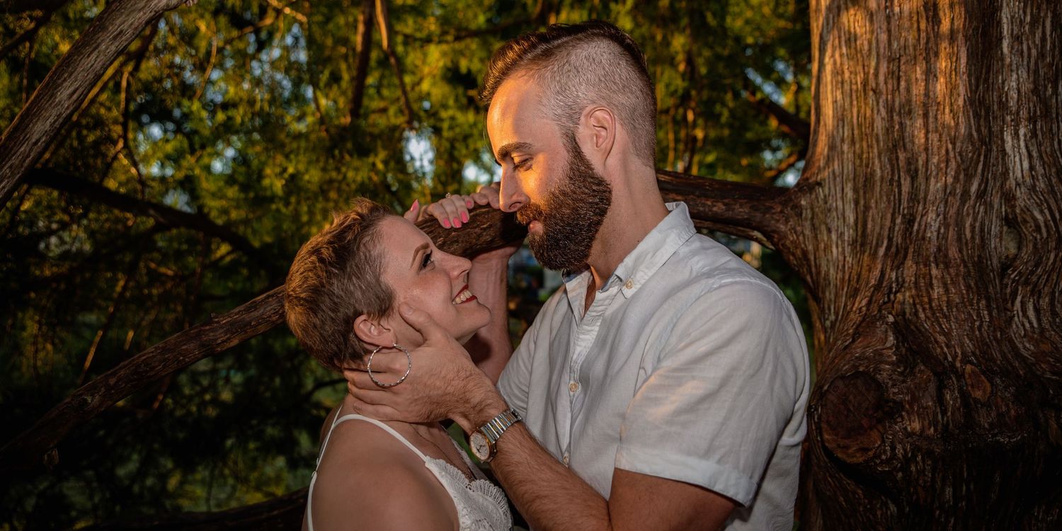 beautiful young couple locked in each others gaze during engagement photoshoot in Winter Park, in Orlando florida