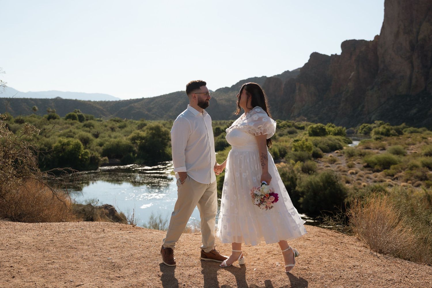 A sequence of wedding ceremony moments showing rings being exchanged and vows being made outdoors.