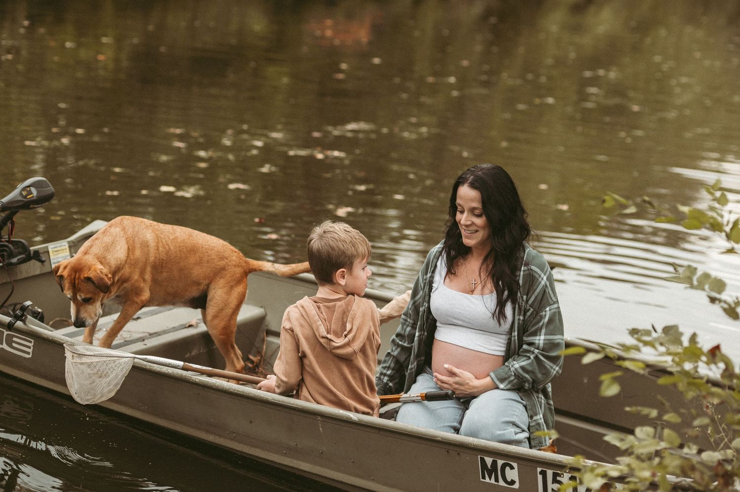 Expecting parents supporting each other while strong contractions are happening in their Chesapeake home.