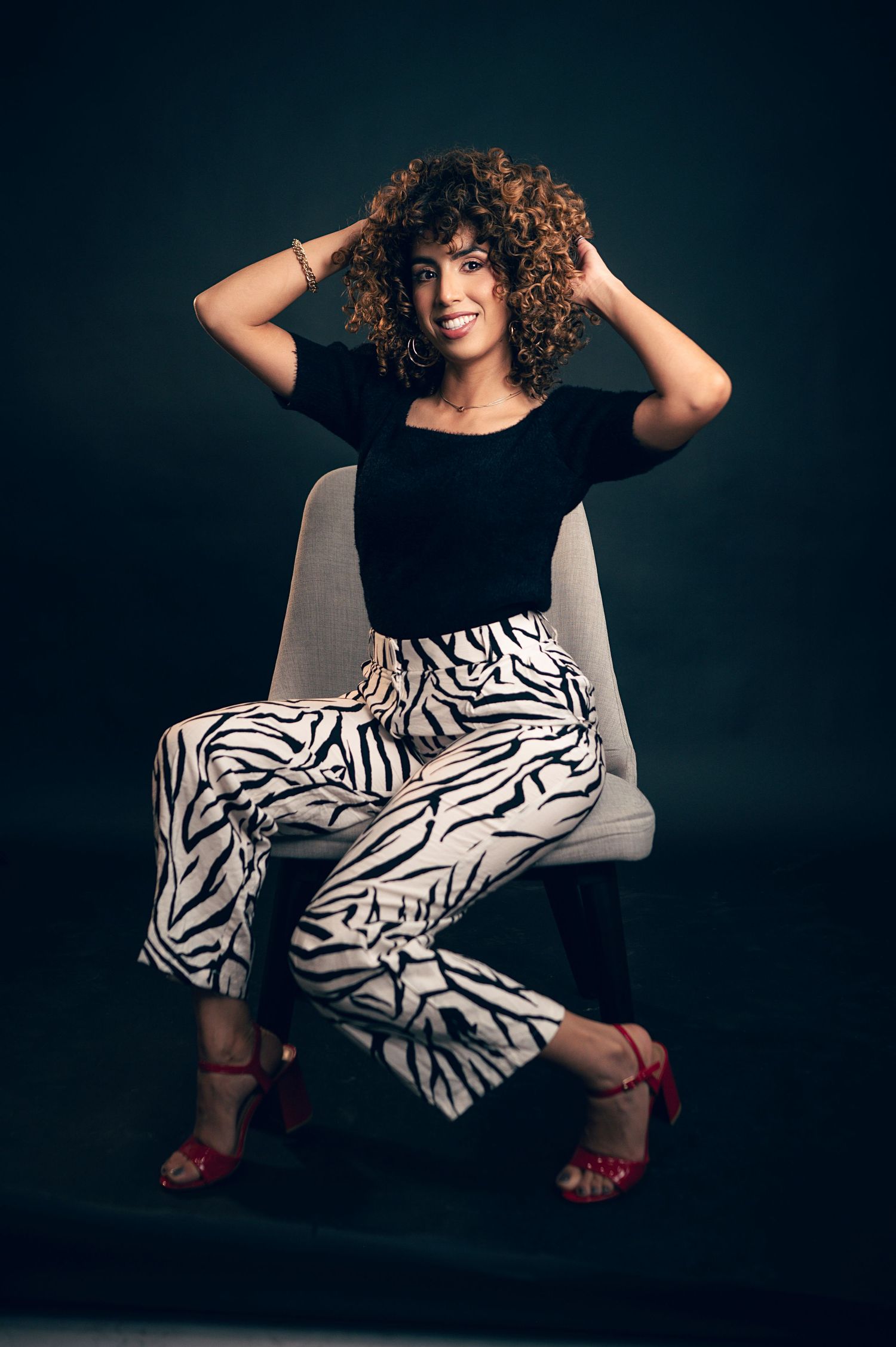 Utah Branding and Headshot photographer in Salt Lake city and Ogden Utah. Creative portraits on a dark moody background in studio.