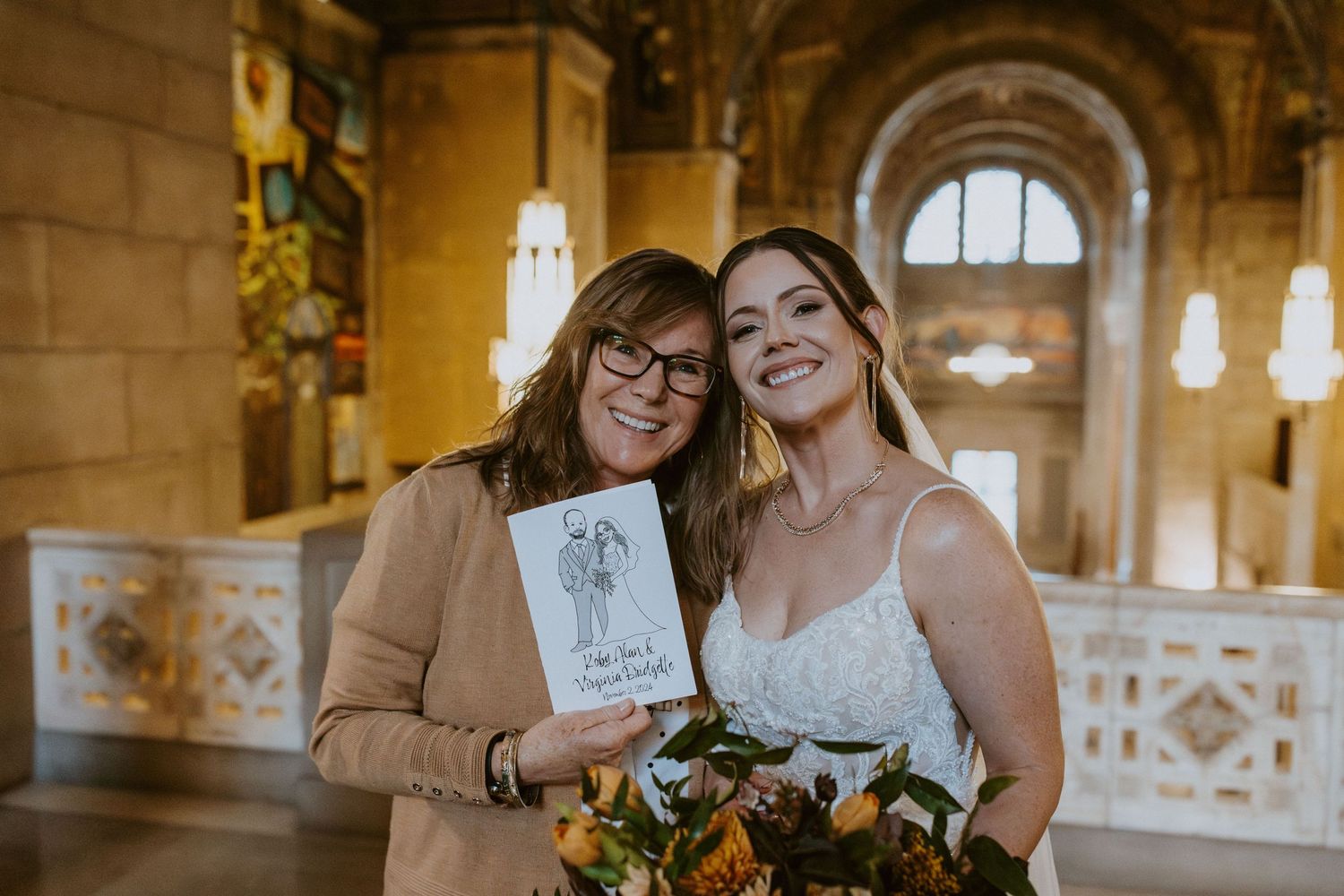Family smile together at The Nebraska State Capitol after a Nebraska Elopement by Christa Schiessl Photography