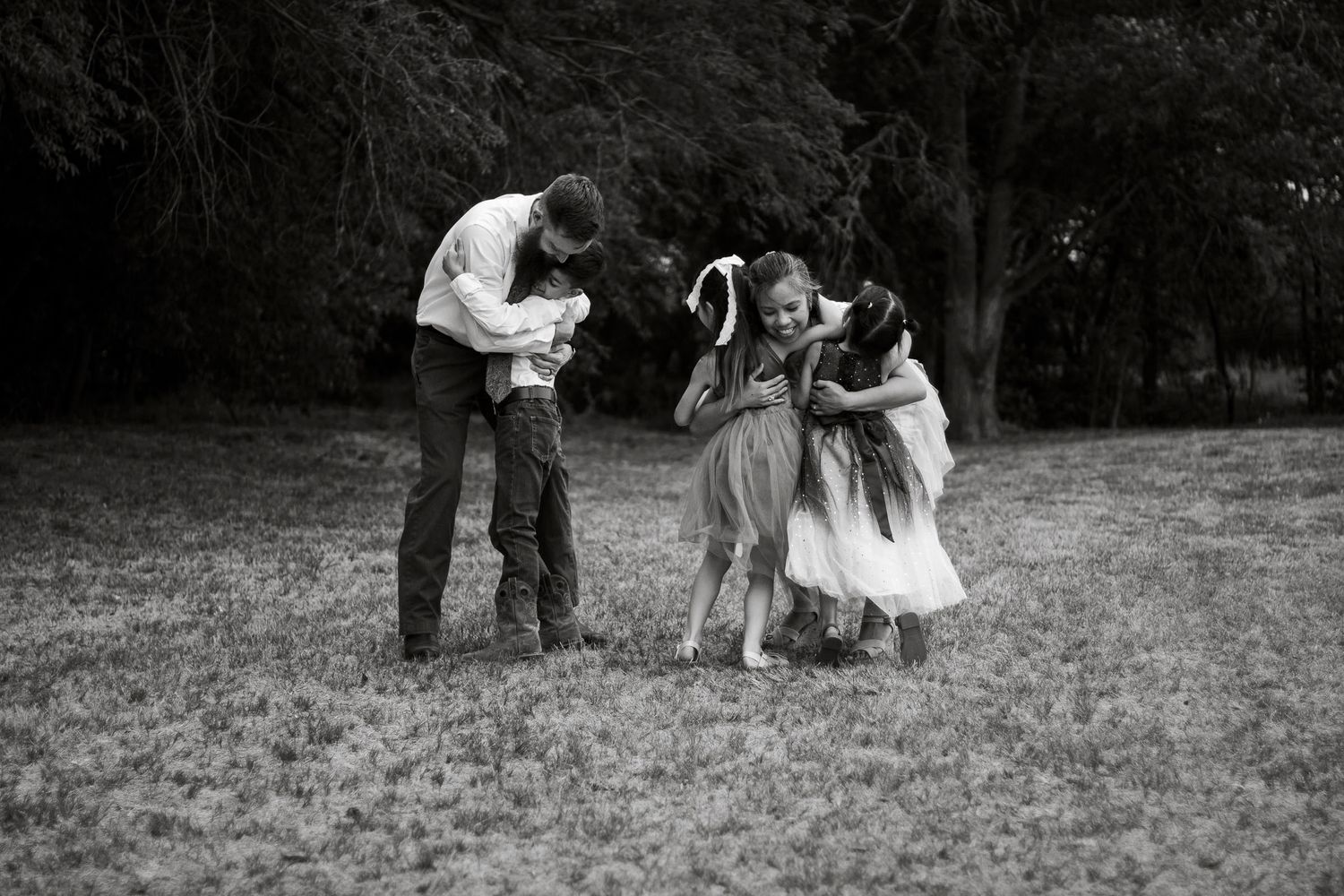 A family of five during a family photo session at The League House in Amarillo, Texas