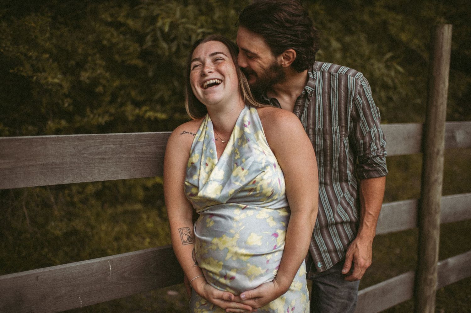 Expecting parents supporting each other while strong contractions are happening in their Chesapeake home.