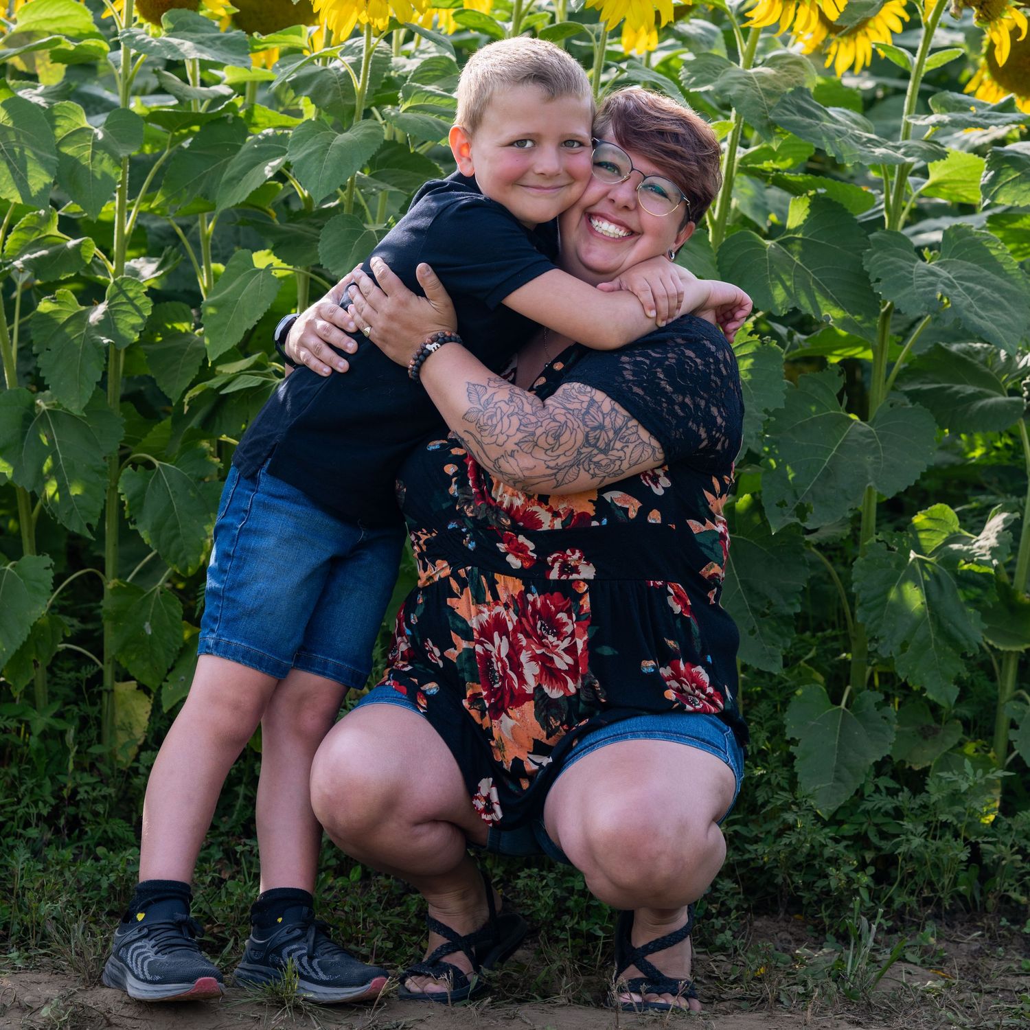 Mom and son pose for family photo at New Hampshire Sunflower Mini Session