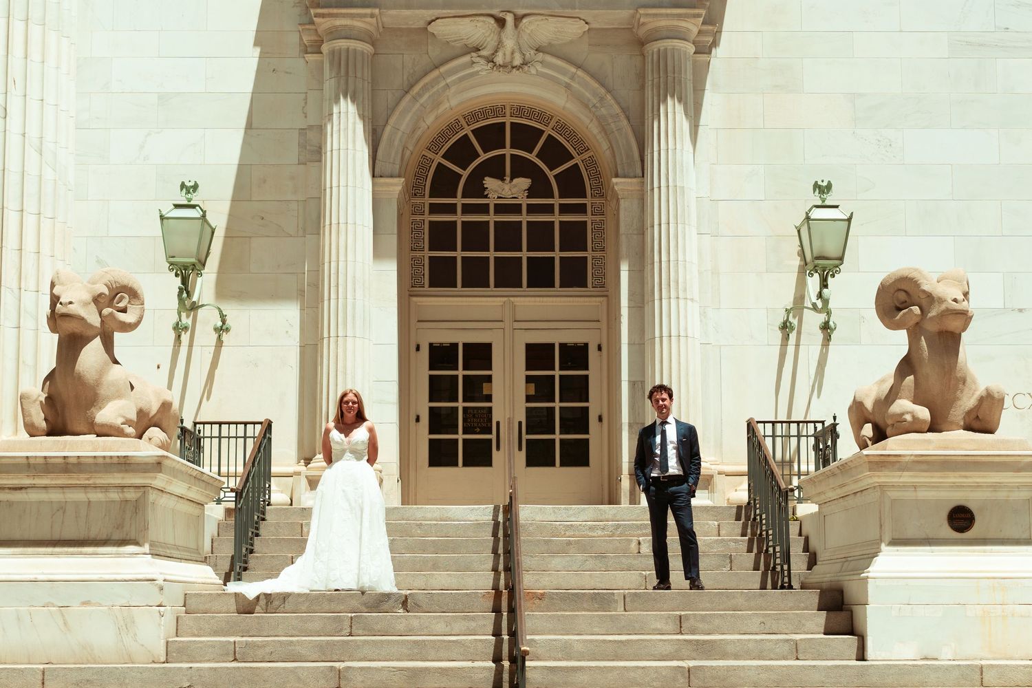Newlyweds exiting Holy Ghost Catholic Church in Denver greeted by guests after summer Catholic wedding