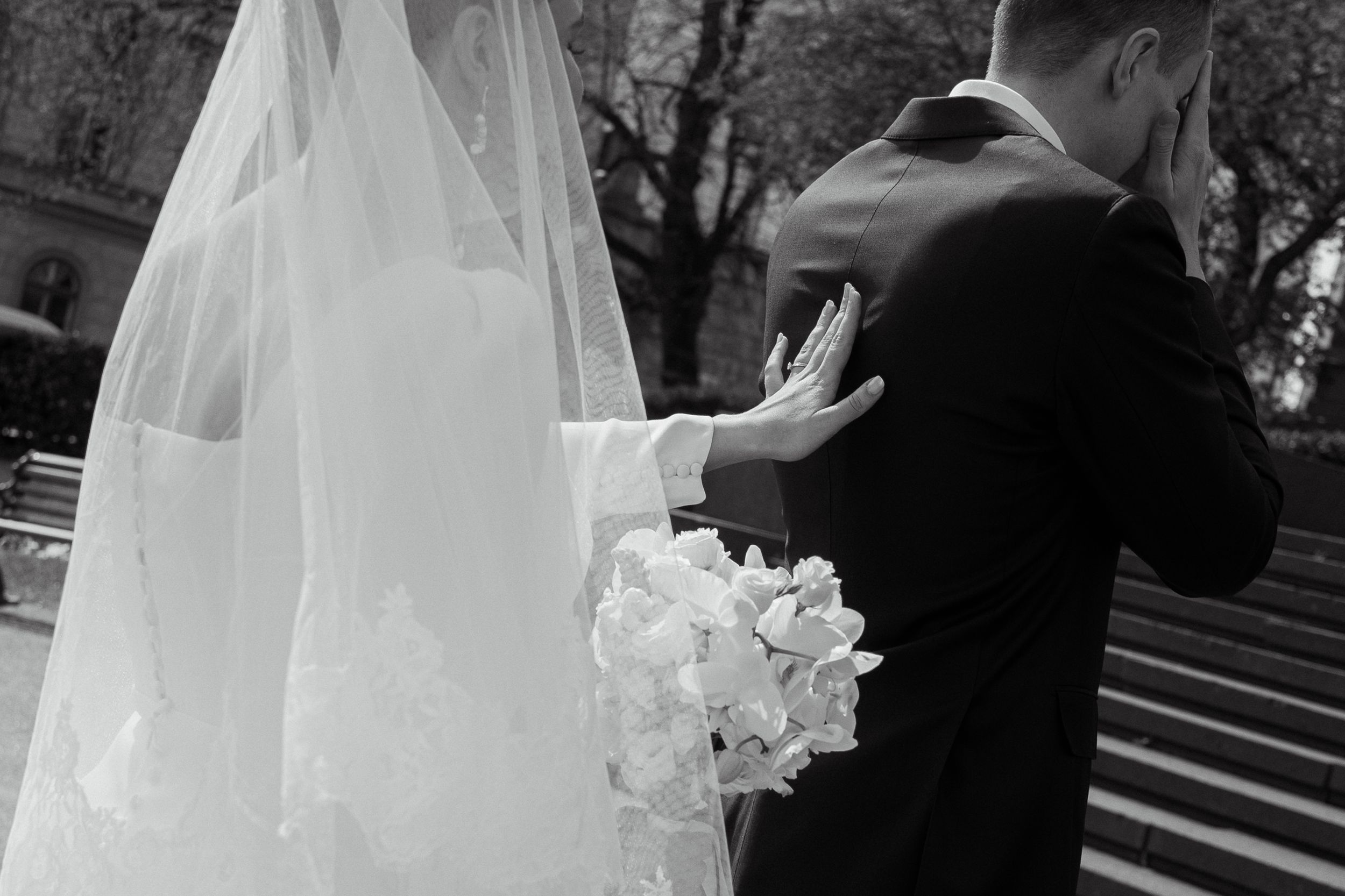 Emotional wedding first look moment between bride and groom