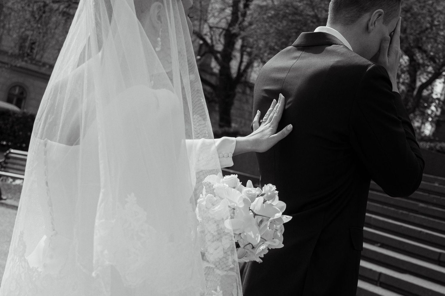 Emotional wedding first look moment between bride and groom