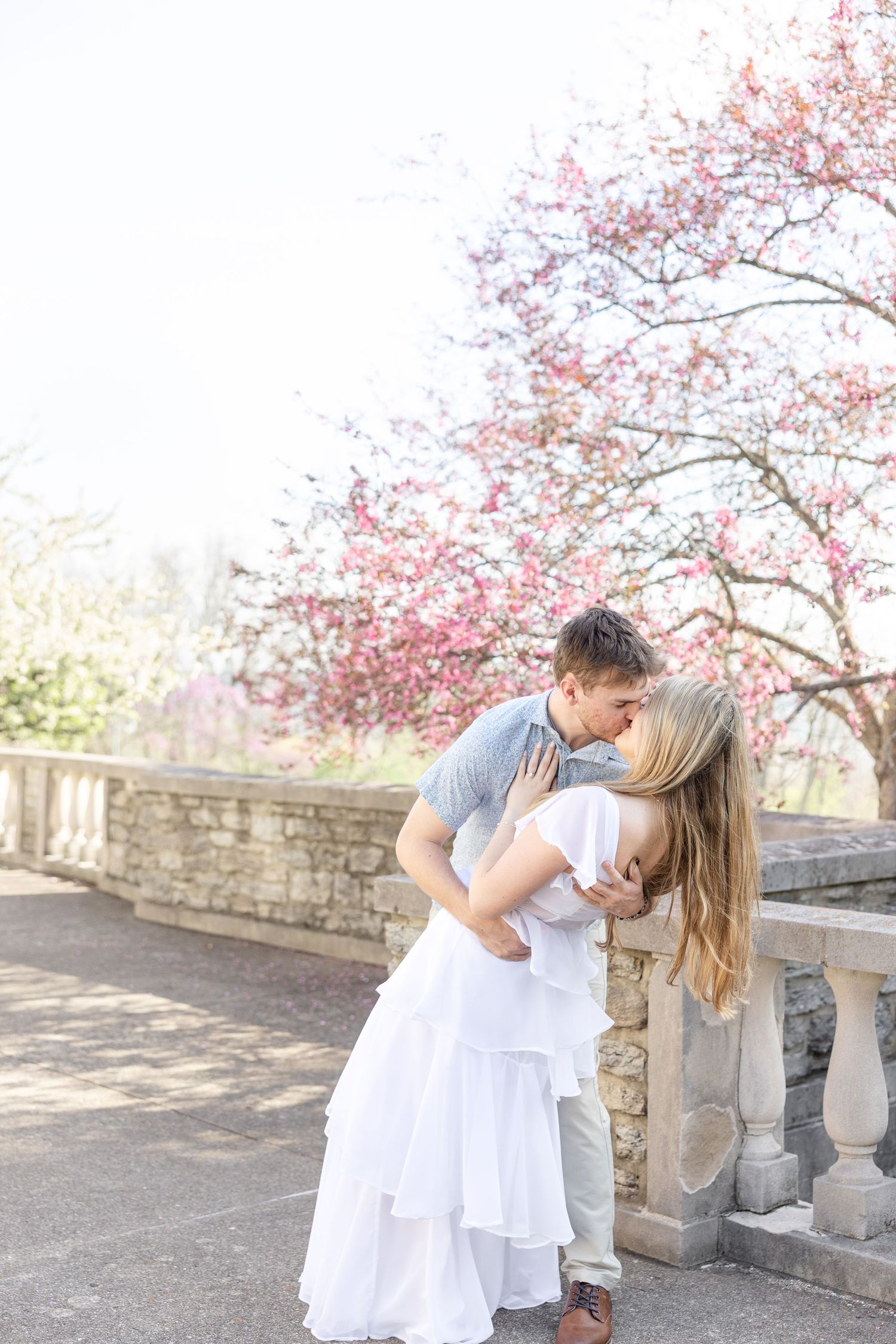 Cincinnati engagement session at Ault Park with light and airy style, capturing joyful, natural moments in a spring park setting