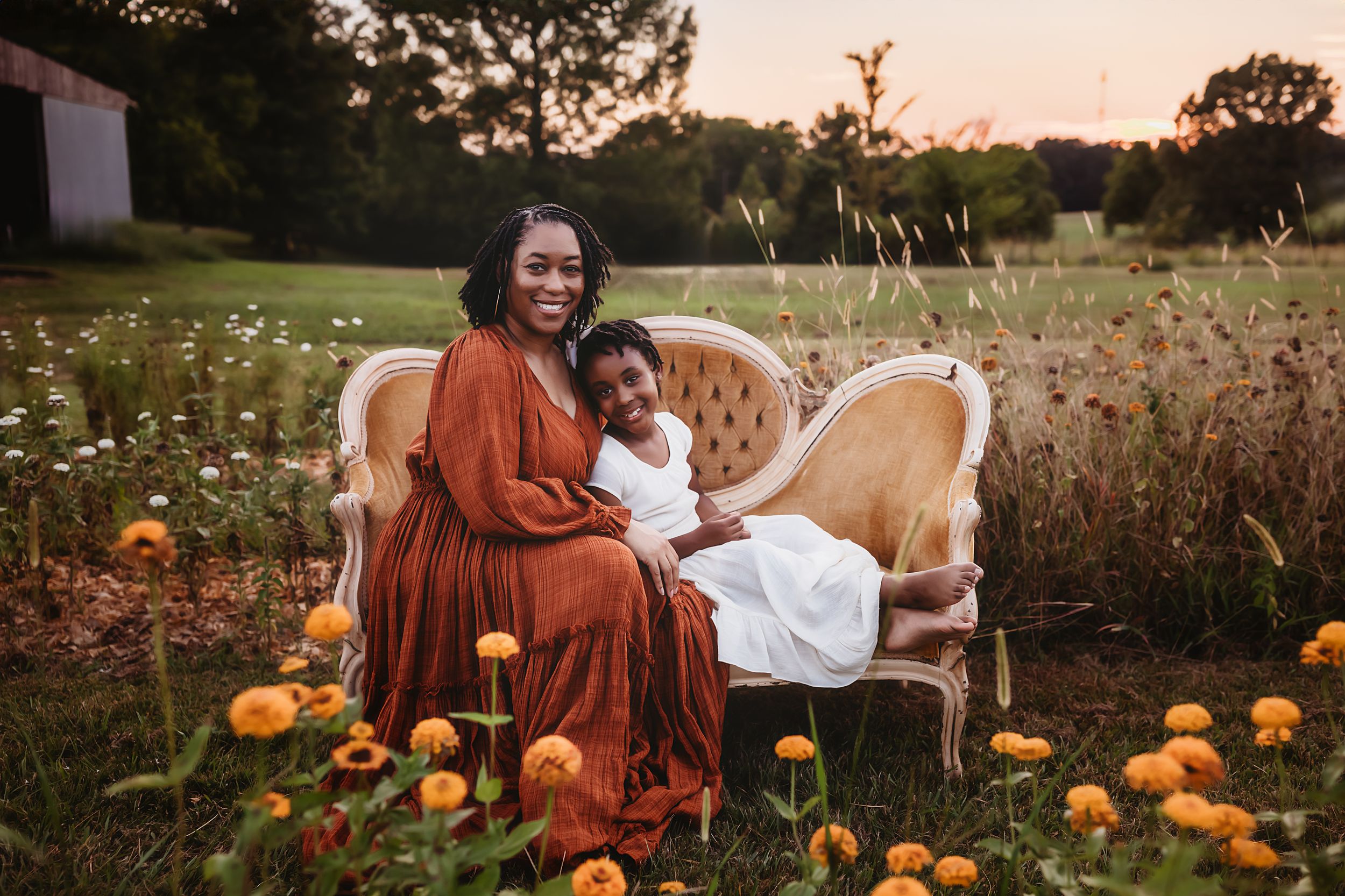 A magical fall pumpkin patch scene with golden hour light illuminating rustic autumn decor and seasonal harvest displays.