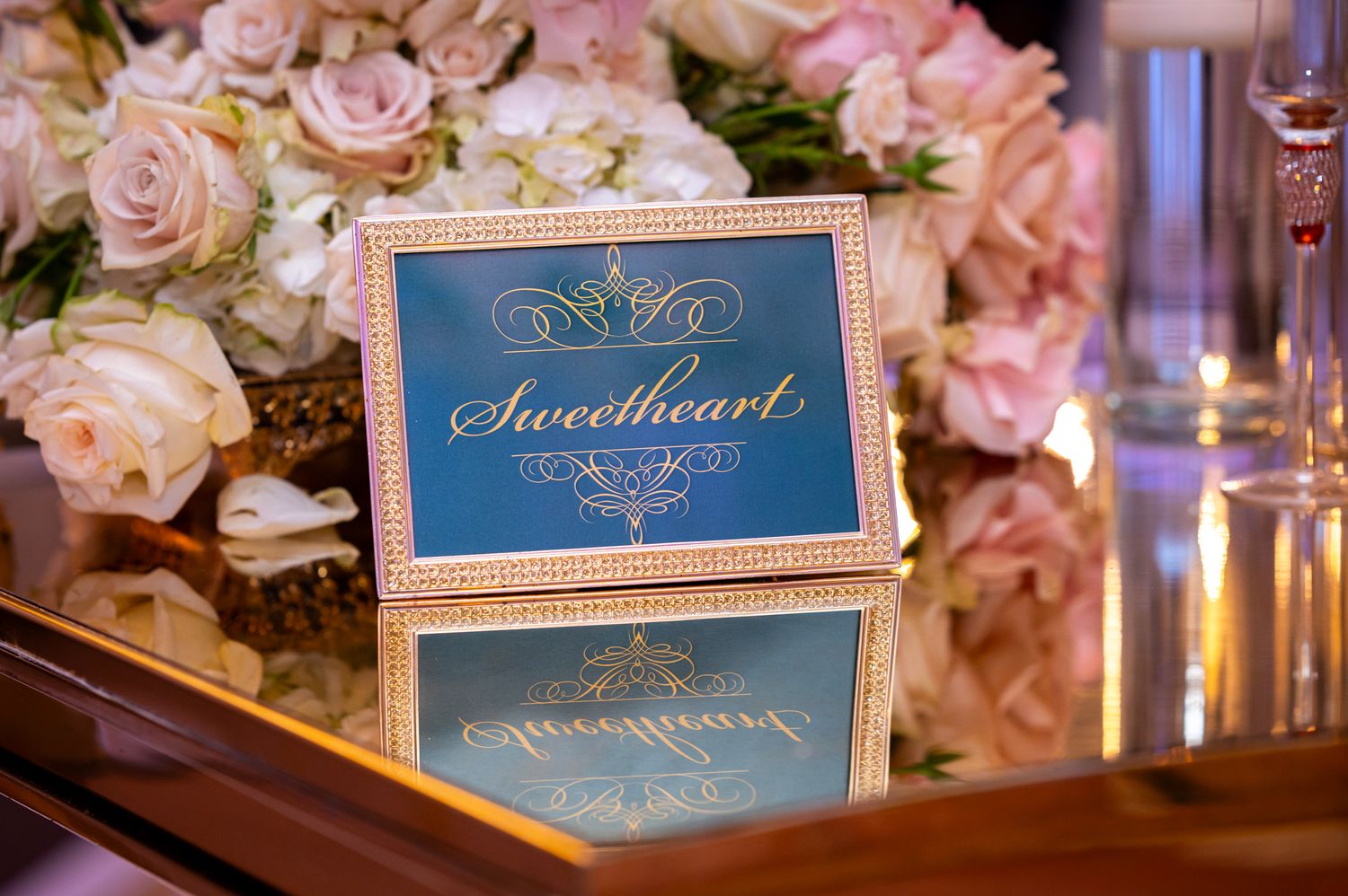 A photograph of the sweetheart table decor captured by South Florida wedding photographers.