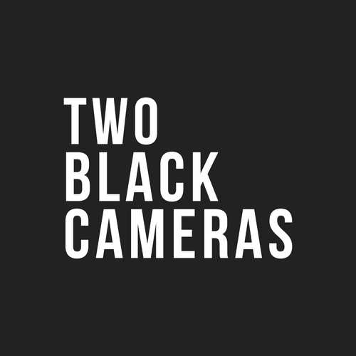 Two Black Cameras