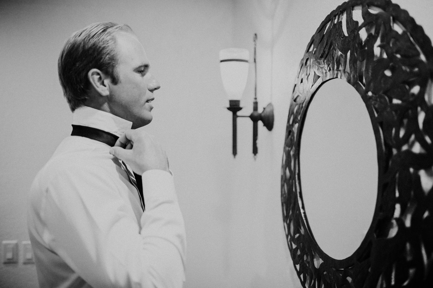 Artistic black and white photo series showing intimate wedding moments and dance scenes.
