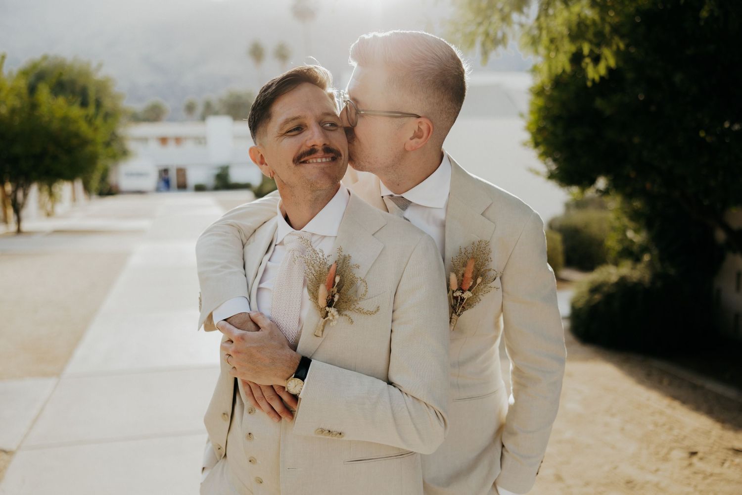 A series of four intimate wedding photos taken outdoors with a soft, romantic aesthetic and golden lighting.