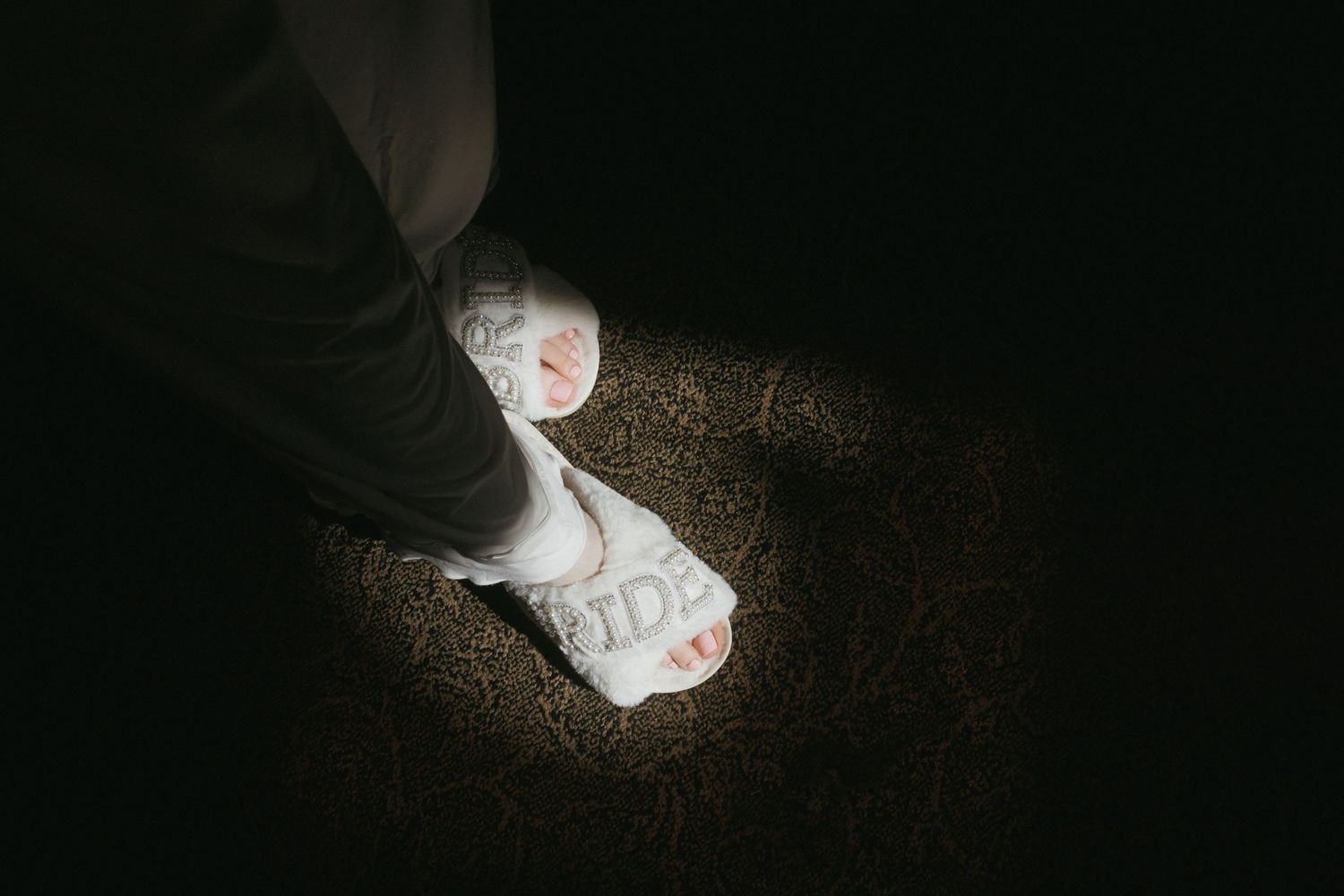 Close-up of bridal sandals with 