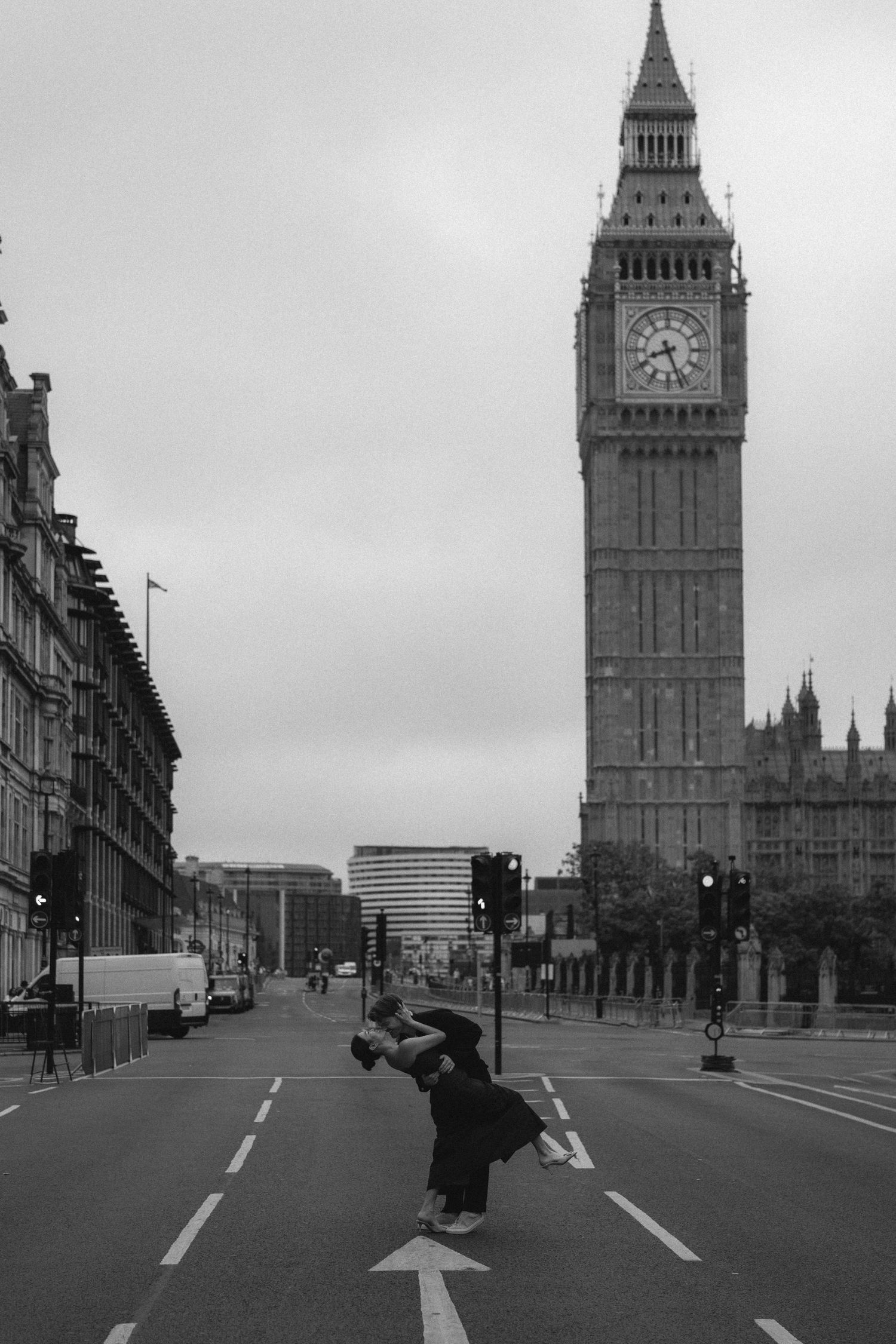 A sequence of black and white photos showing a skateboarder performing tricks near Big Ben in London.