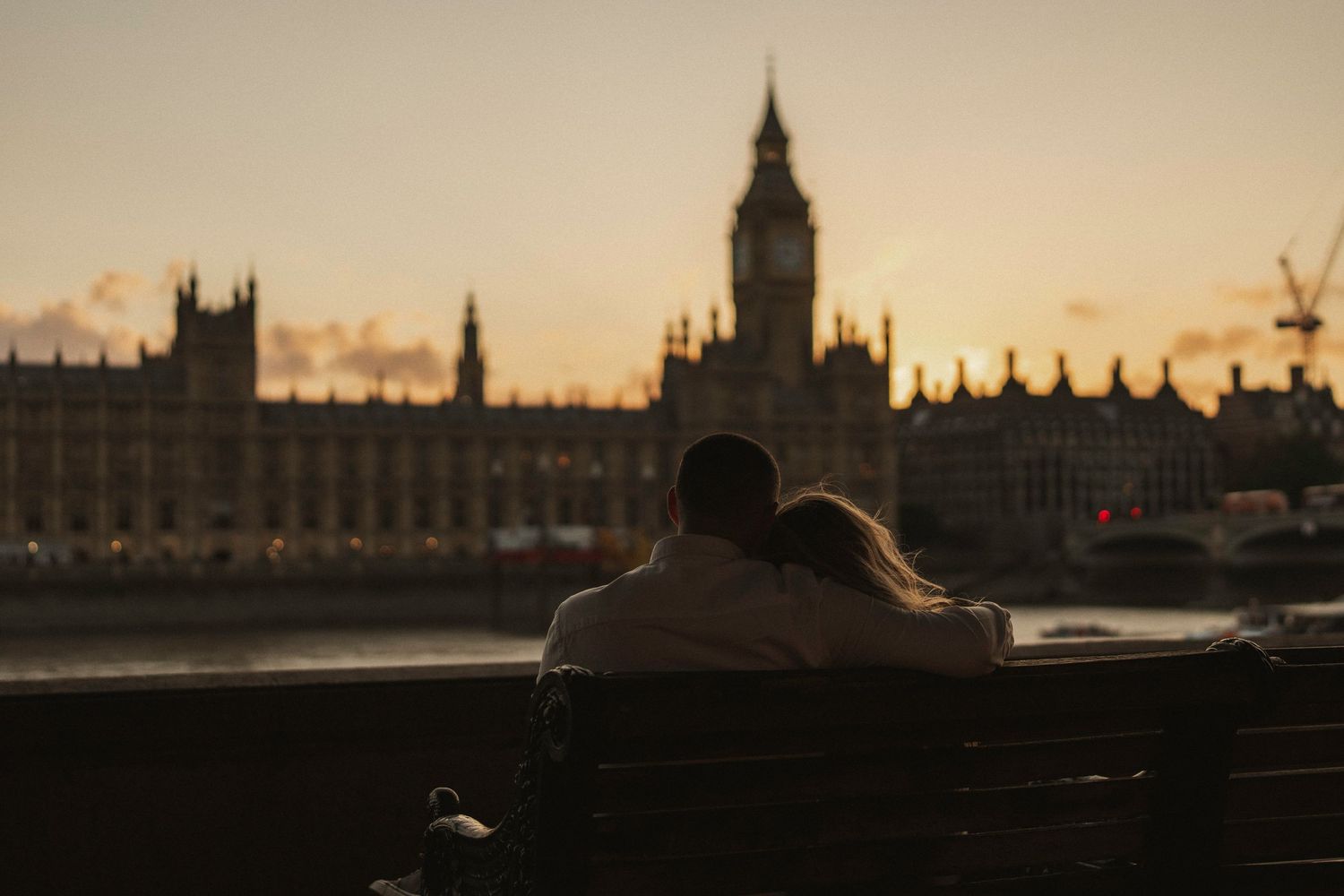 A panoramic sequence of London's skyline at sunset showing the Houses of Parliament and Big Ben along the Thames River.