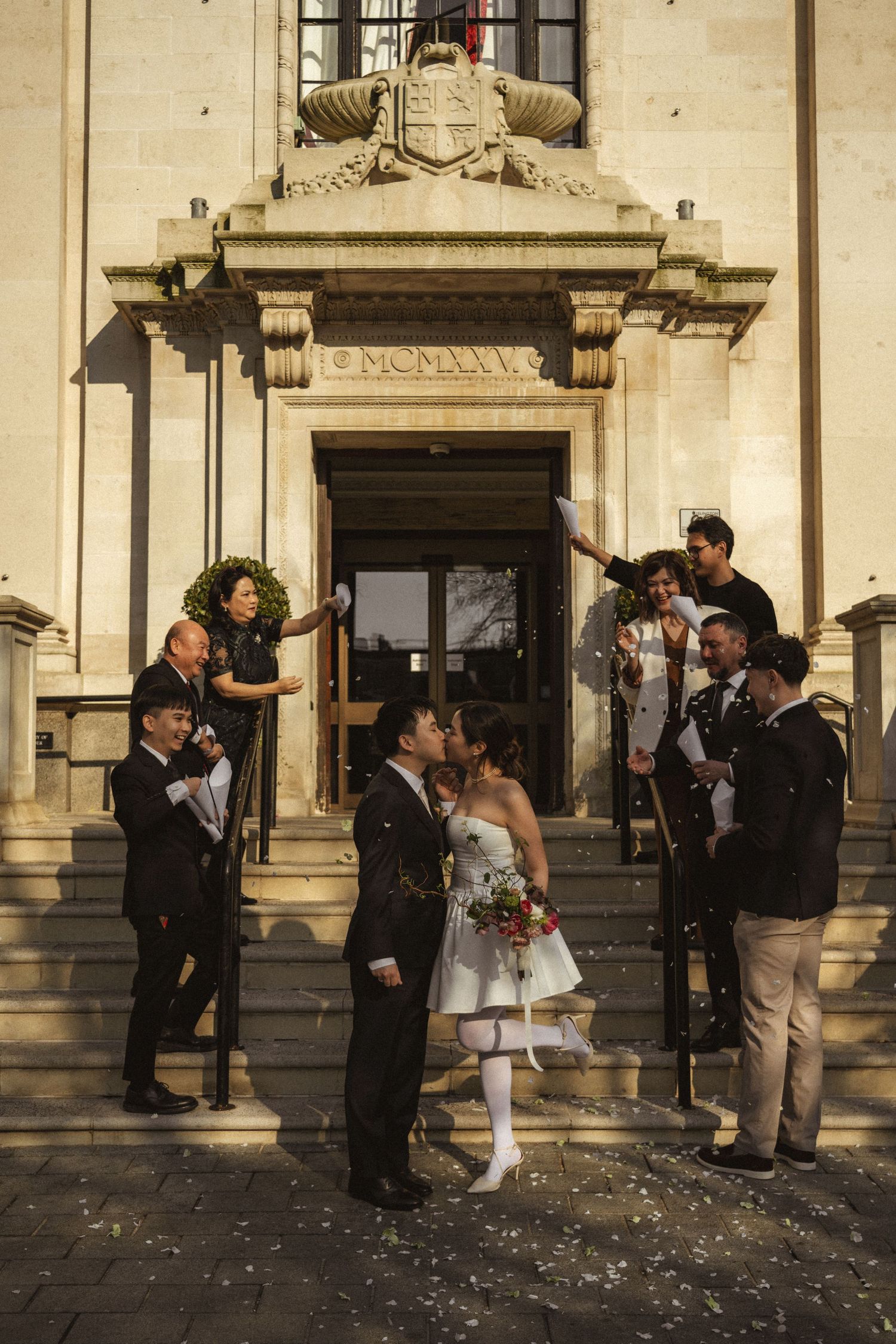 A series of five wedding photos showing couples outside a historic building with confetti being thrown.