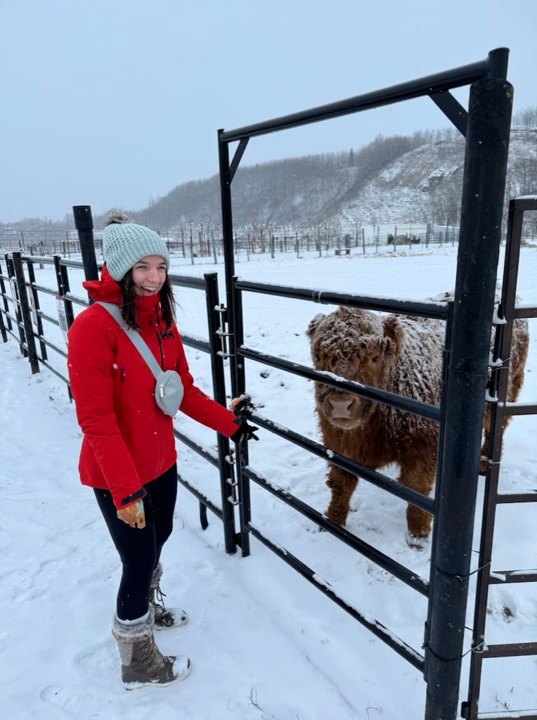 Travel photographer Athena Arnold at reindeer farm in Alaska.