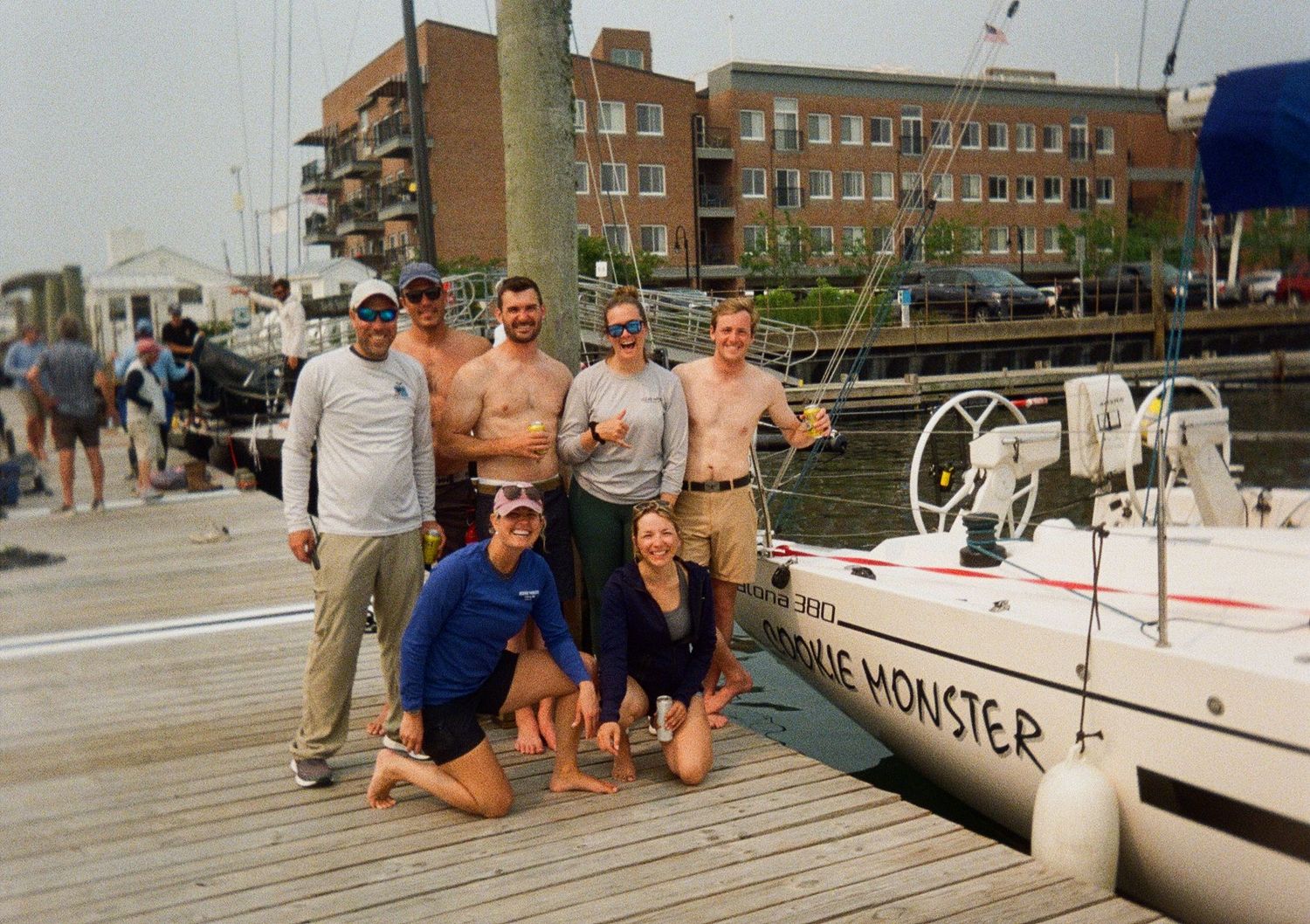 Adventure photographer Athena Arnold and sailing team on the dock in Newport RI.