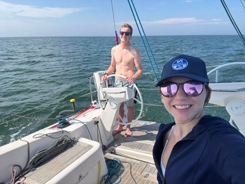 Travel photographer Athena Arnold sailing in the Atlantic ocean.