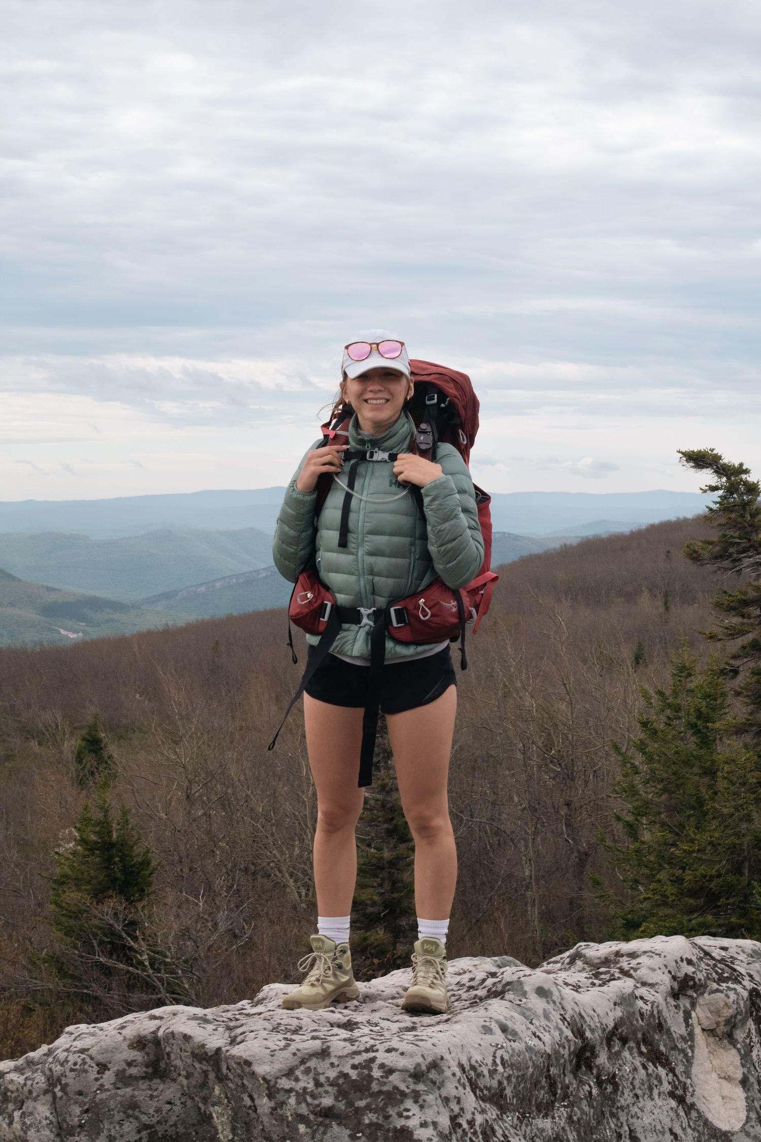 Athena Arnold adventure and travel photographer hiking in West Virginia State Park.