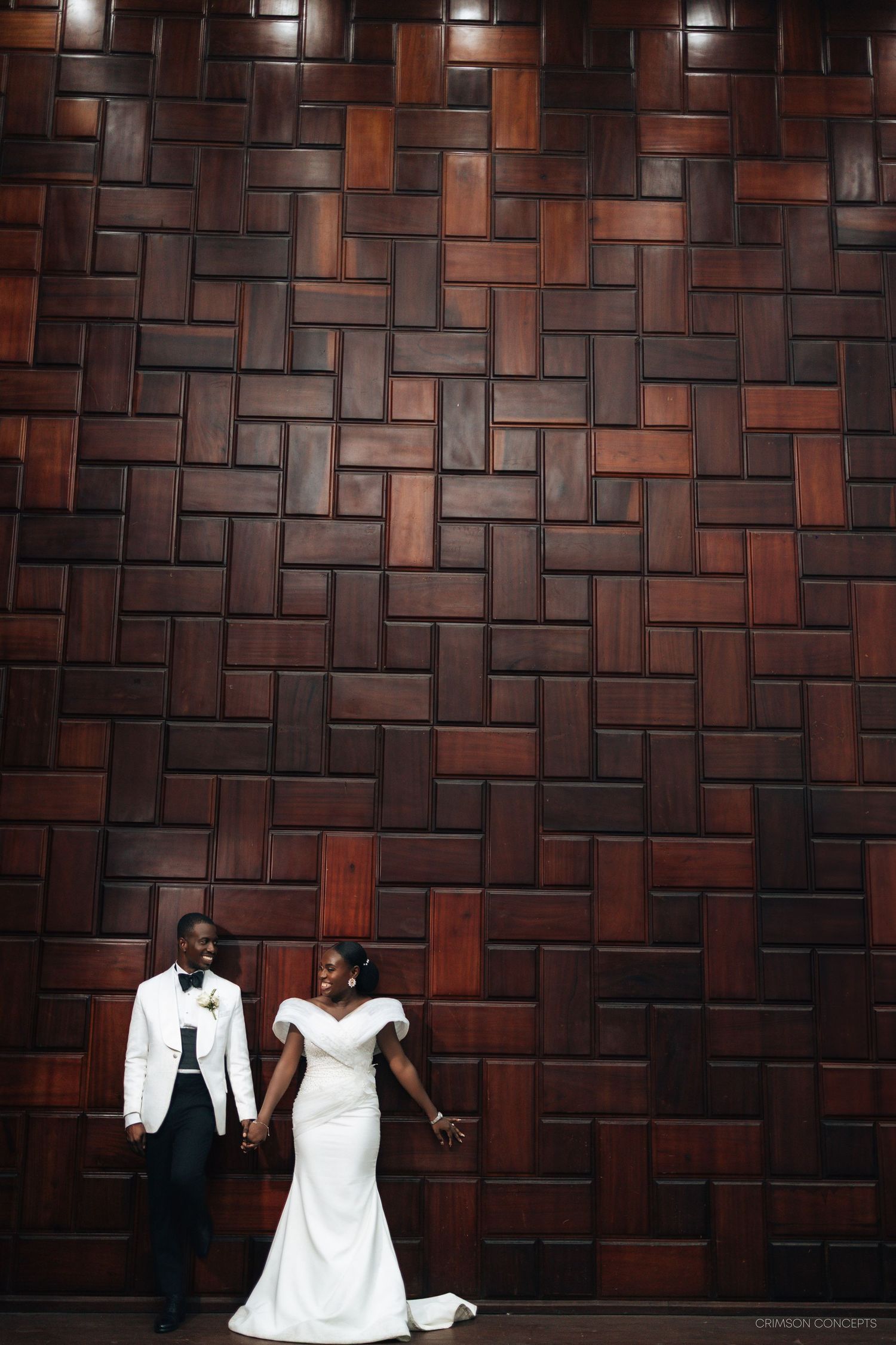 Bride and groom sharing an intimate moment after their wedding ceremony in Accra