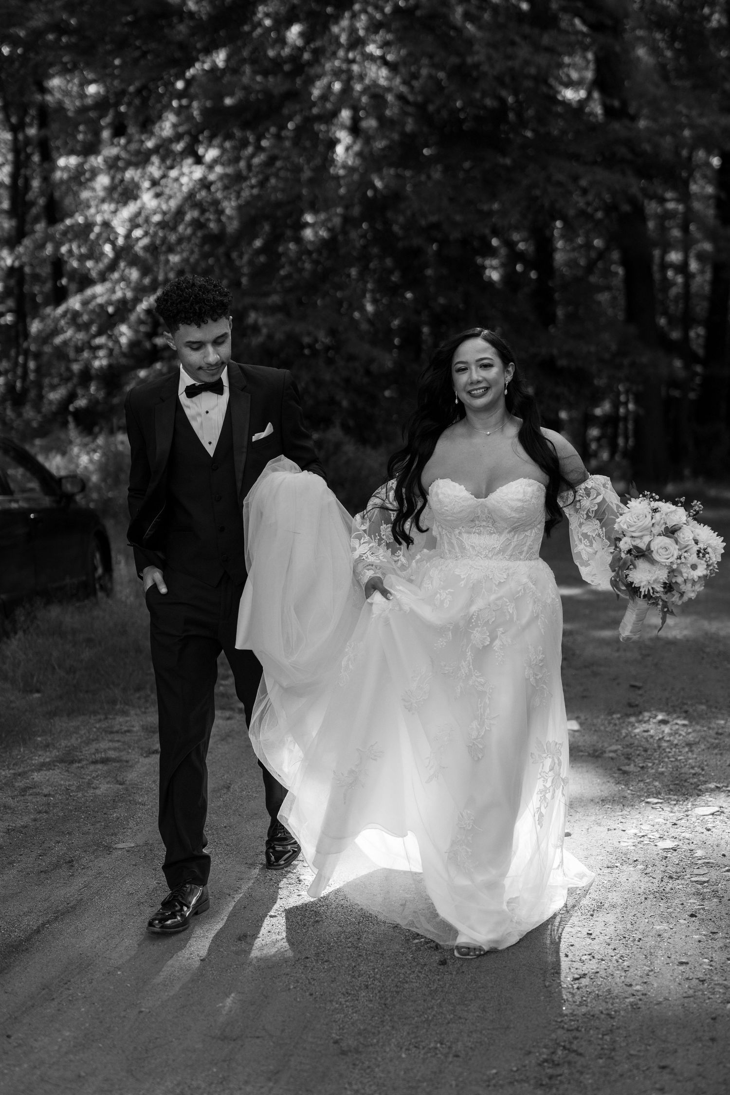 Black and White Portrait of couple in the sun on a a summer day at Evergreen Farms.